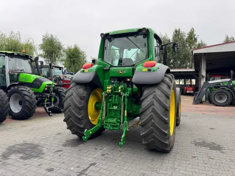 JOHN DEERE 6534 / Przednia oś amortyzowana TLS / PowrQuad Plus /