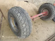 Oś z kolami wywrotka