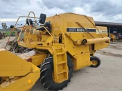 Kombajn Sampo 500 z sieczkarnia sprowadzony Massey Ferguson 330 claas