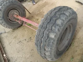 Oś z kolami wywrotka